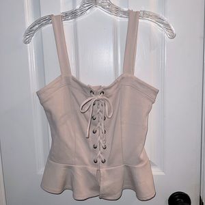 Lace-up peplum tank top